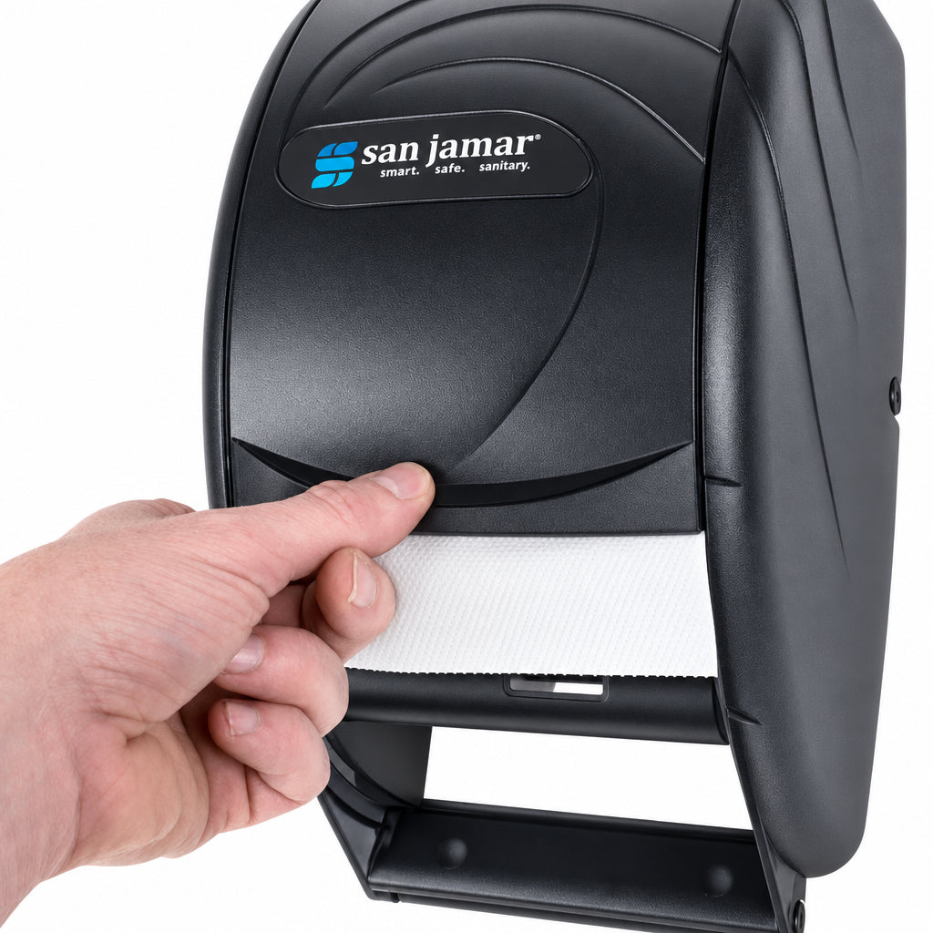 Hand opening a black San Jamar multi-roll tissue dispenser